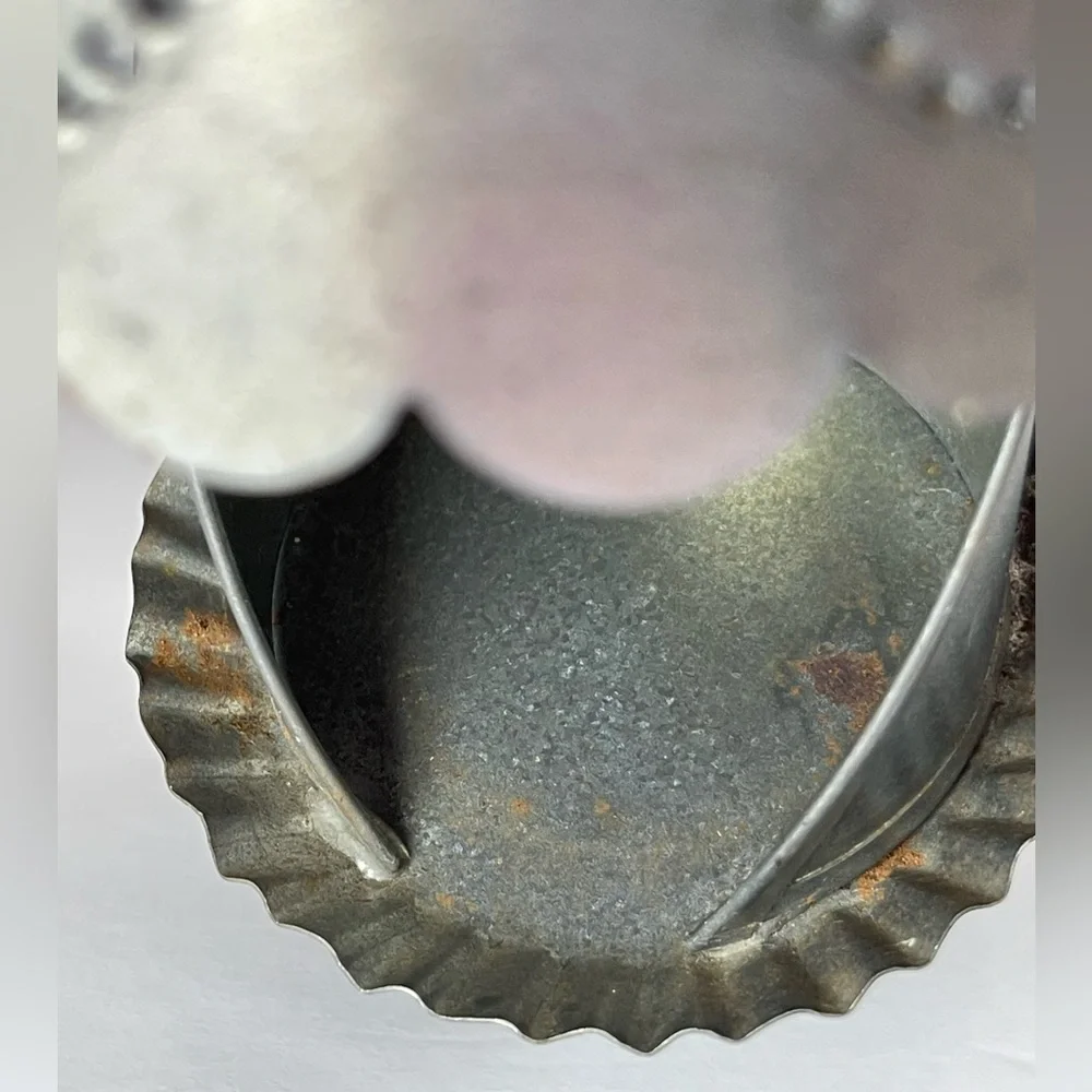 Vintage punched tin tea light candle holder